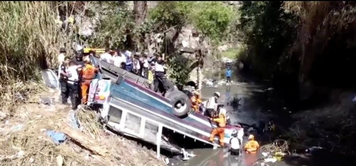 At least 50 die in Guatemala after bus plunges off bridge