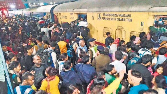 Children among 18 killed in crush at New Delhi train station